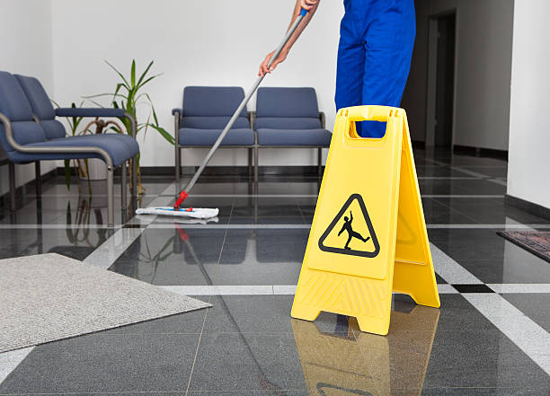Man With Mop And Wet Floor Sign Close-up Of Man Cleaning The Floor With Yellow Wet Floor Sign slippery stock pictures, royalty-free photos & images