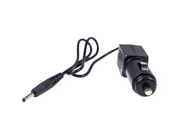 istock Mobile charger In car on White background. 473445354