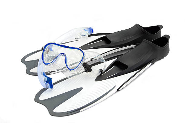 istock White diving flippers, snorkel and goggles 473446134