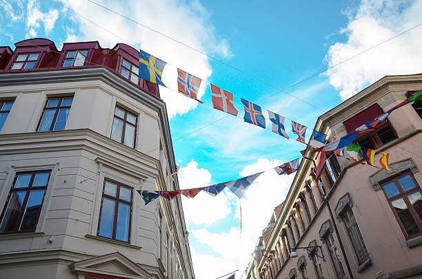 istock Europe Flags Hanging on Buildings 473446572