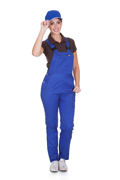 istock Portrait Of Happy Plumber While Holding Cap 473446574