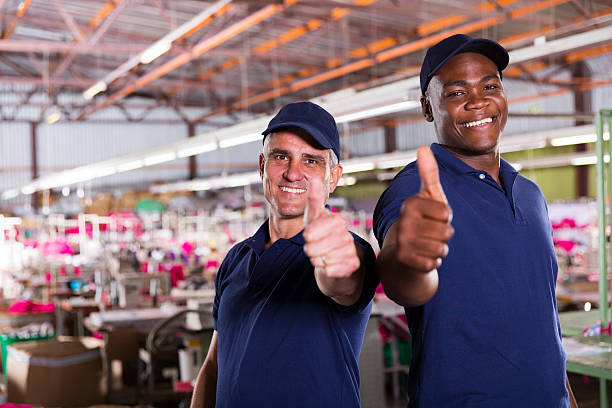 istock factory supervisors giving thumbs up 473447824