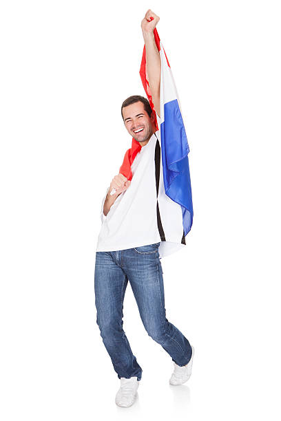 istock Happy Man Holding An Netherlands Flag 473448830