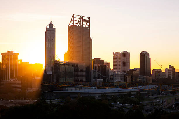 istock Perth City at Sunrise with mist creating sunrays 473452234