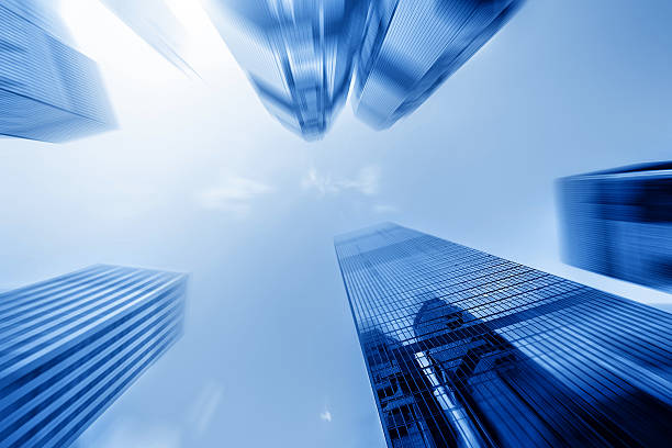 istock low angle view of skyscrapers in blurred motion. 473455674