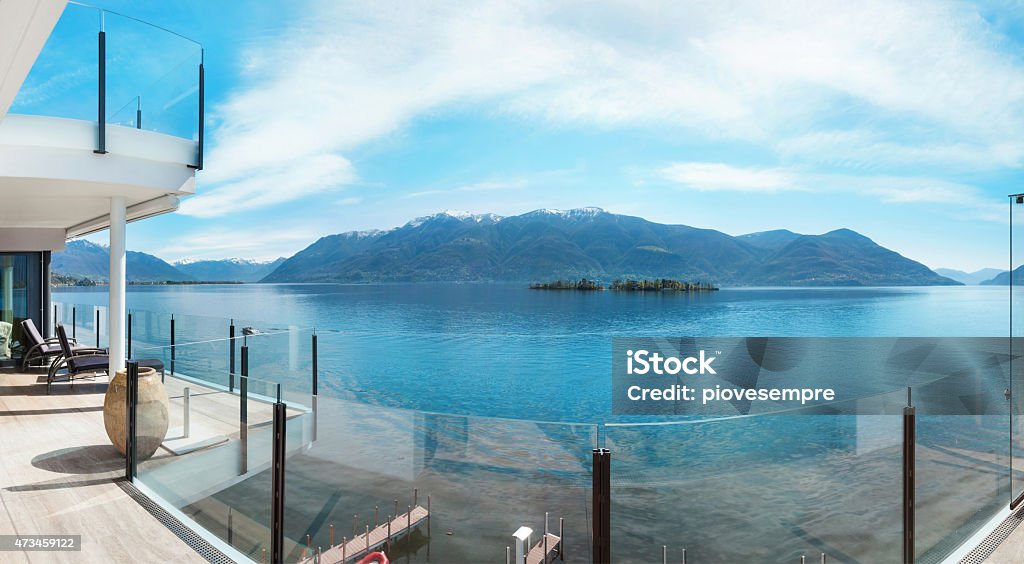 beautiful landscape of an alpine lake beautiful terrace of a modern penthouse, lake view 2015 Stock Photo