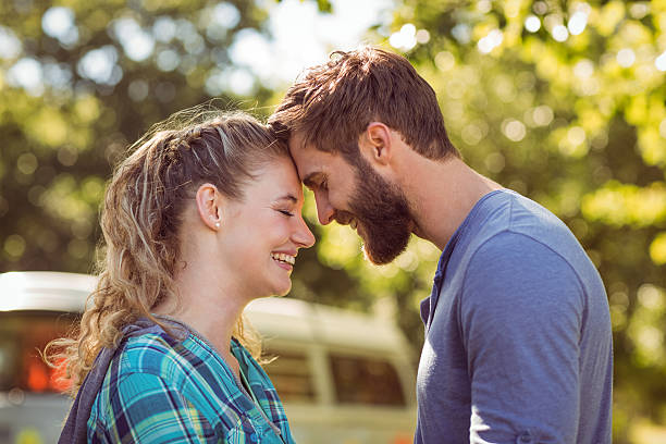 istock Hipster couple smiling at each other 473459666
