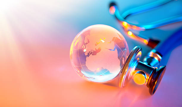 istock globe and stethoscope - heat rays on sick planet 473460014