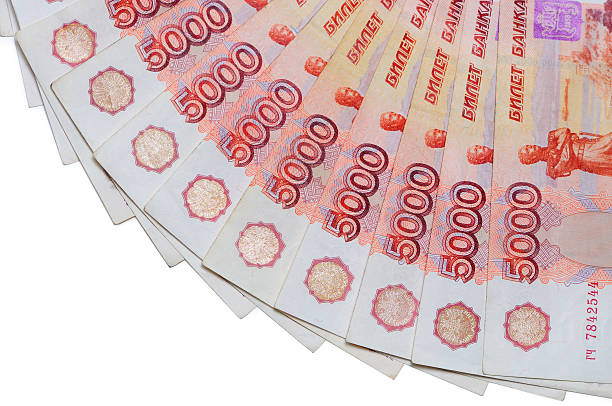 istock Banknotes of 5000 Russian rubles are located around. 473461720