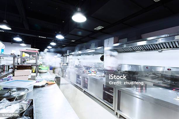 Modern Kitchen And Busy Chefs Stock Photo - Download Image Now - Commercial Kitchen, Stainless Steel, Equipment