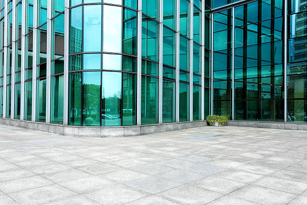 istock Empty road near modern building exterior 473463572