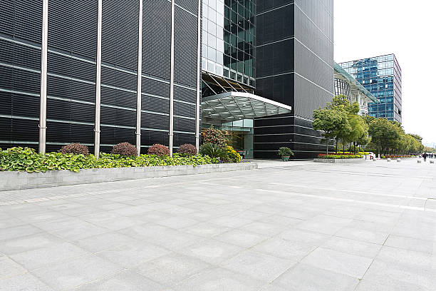 istock Empty road near modern building exterior 473463592