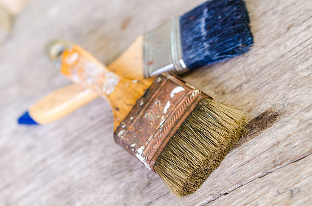 istock Old paintbrush on wooden background,vintage 473470536