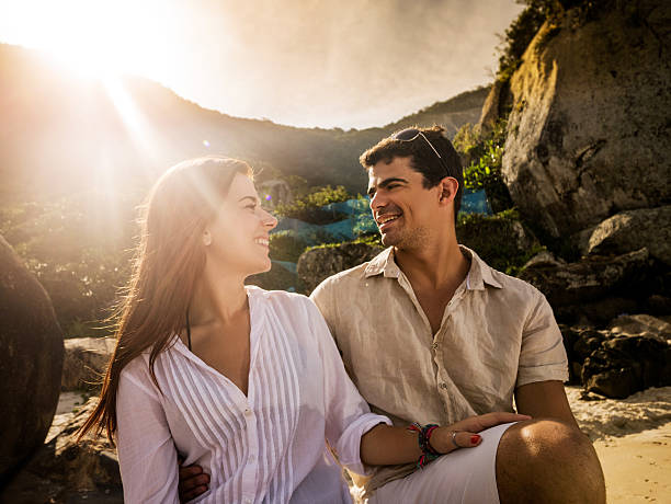 istock Romantic Hispanic couple enjoying in summer day and communicating. 473474032