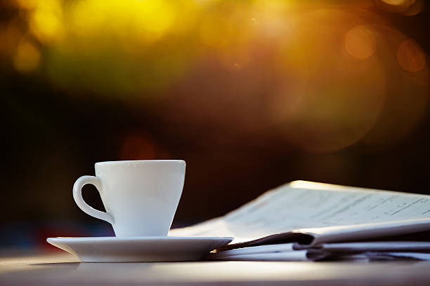 istock Morning coffee with a newspaper and smartphone 473474136
