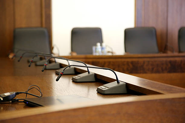 istock Microphones in conference room 473482922