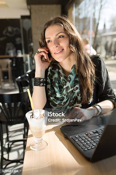 Working Best At Coffee Shops Stock Photo - Download Image Now - 20-29 Years, 2015, Adult