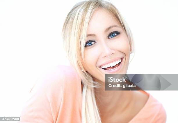 Portrait Of Smiling Blond Woman Stock Photo - Download Image Now - 20-29 Years, 2015, 30-39 Years