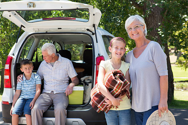 istock Grandparents going on road trip with grandchildren 473486280