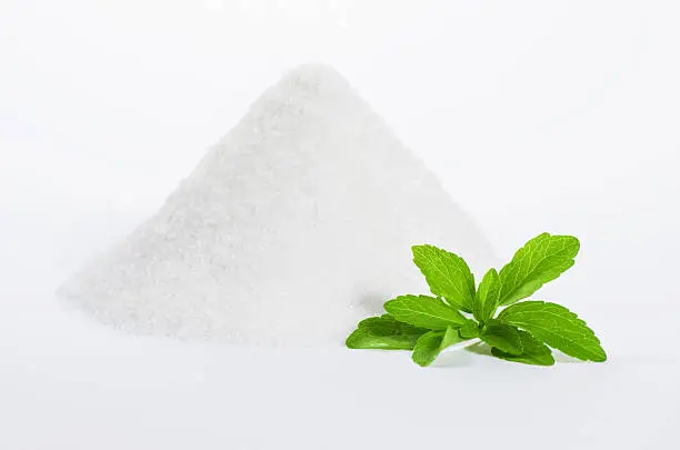 stevia with a pile of sugar