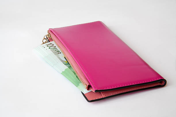 istock purse with money 473491734
