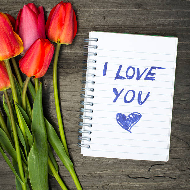 istock tulip bouquet and notepad with words 