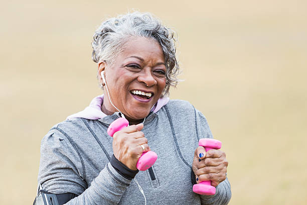 istock Senior African American woman exercising 473519612