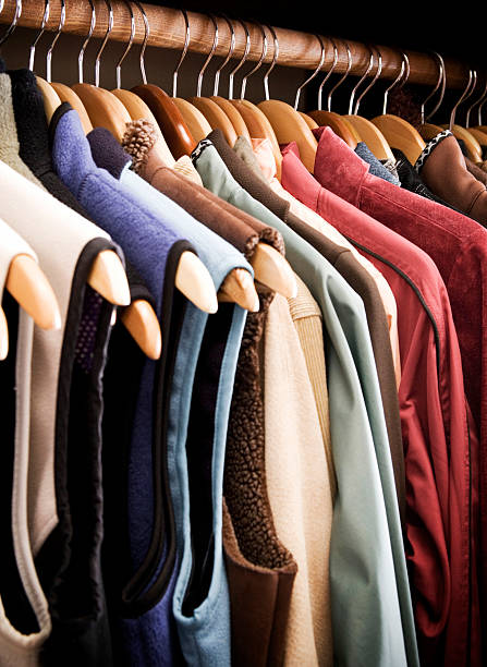 istock Closet filled with women's vest and coats. 473522560