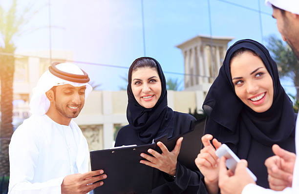 istock Four arab business people outside 473531998