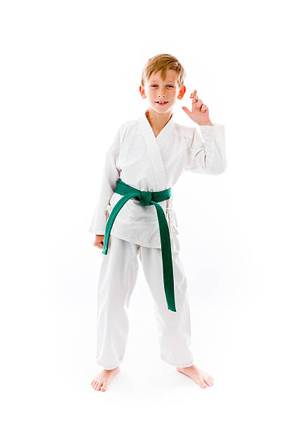 istock model isolated with fingers crossed for luck 473534992
