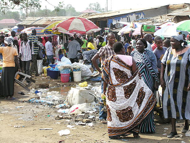 Women argue at Konyo Konyo Market, Juba, South Sudan. Juba, South Sudan - February 28th, 2012: Unidentified women argue at Konyo Konyo Market, Juba, South Sudan, February 28, 2012. south sudan stock pictures, royalty-free photos & images