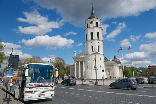 Vilnius, Lithuania - May 02, 2015: Vilnius City Tour bus stopped at the Cathedral square in Vilnius, Lithuania.