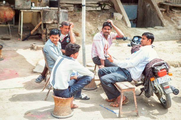 Nimaj, Rajasthan, India - March 7, 2015. Group of Indian men sitting and talking outside in Nimaj, India.