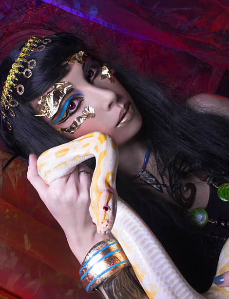 istock Woman with snake. 473550398