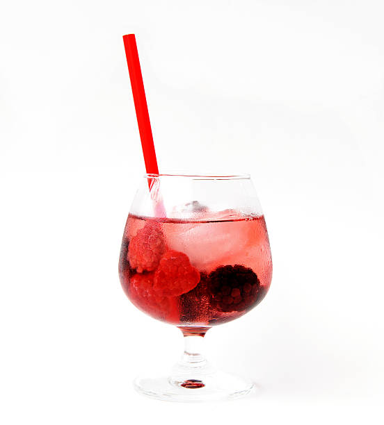 istock healthy mixed berries fruit in glass. On white background 473551374