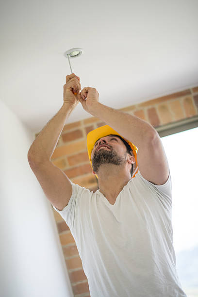 istock Electrician working at a house 473551526