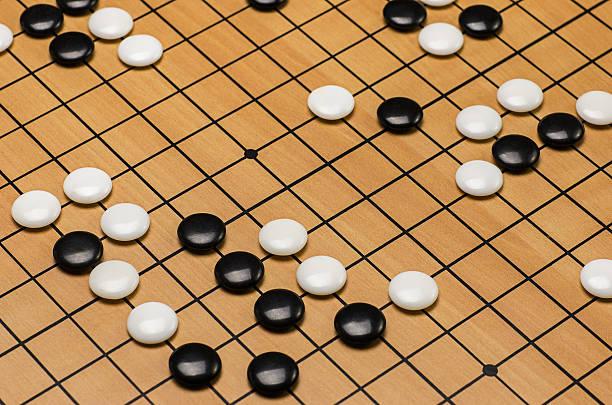 istock closeup of stones on a Go board 473552854