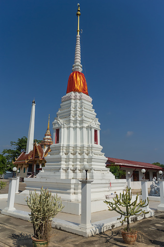 white pagoda with sky background at Wat Khayaeng