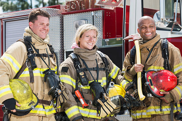 istock Female firefighter with two male colleagues 473556182