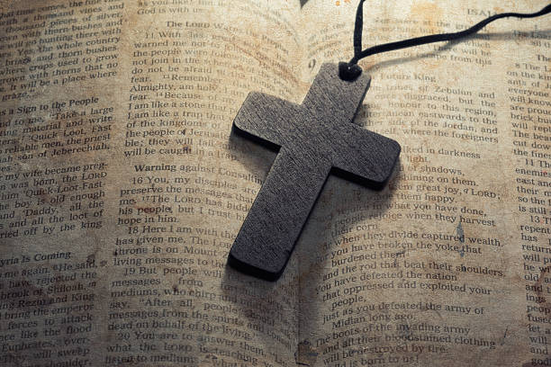istock wooden cross on a old bible 473557456