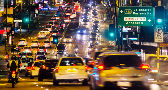 Typically heavy traffic on Parramatta Road, Sydney at dusk.