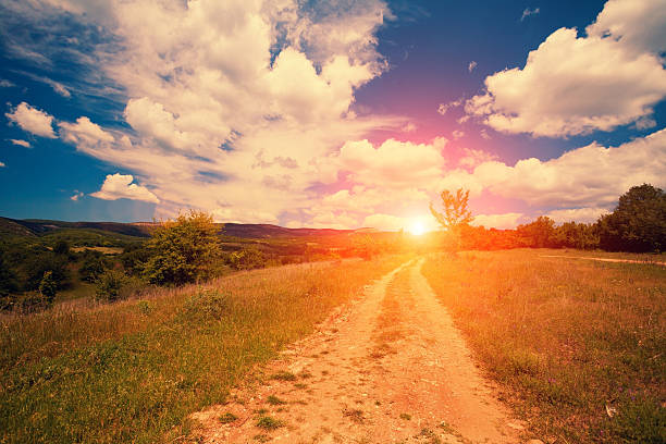istock Beautiful sunset with cloudy sky in countryside 473558594