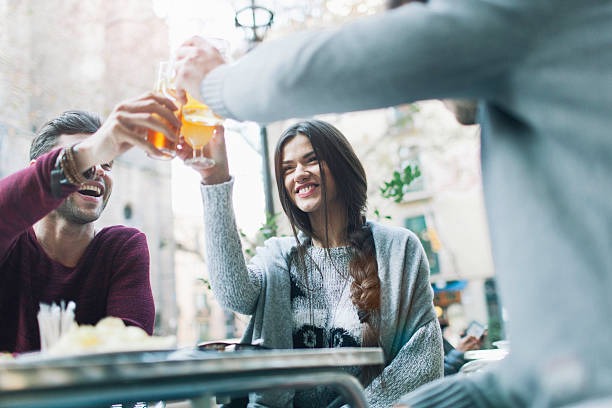 Friends making a toast in Barcelona.