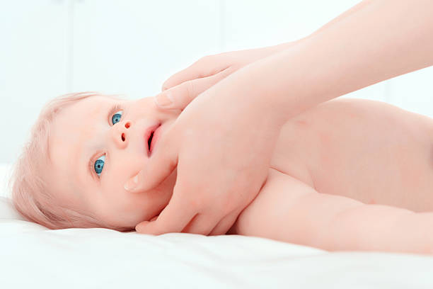 istock Little baby having a massage 473564182
