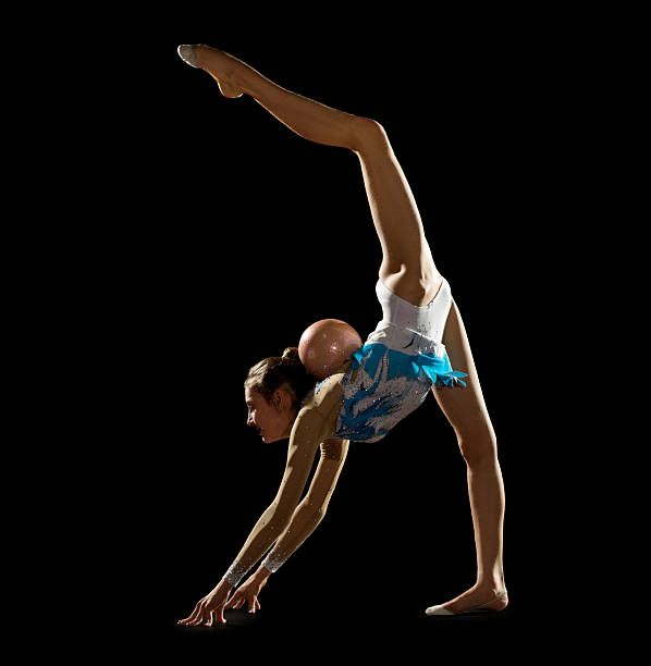 istock Young girl engaged art gymnastic 473564470
