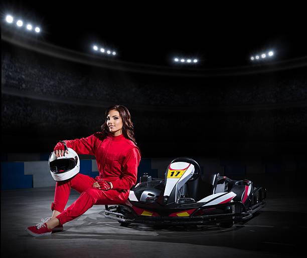 istock Girl karting racer at stadium 473564508