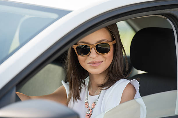 istock Girl driving car 473564838