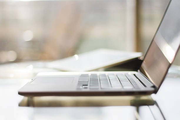 istock Modern laptop at sunrise, shallow depth of field 473565476