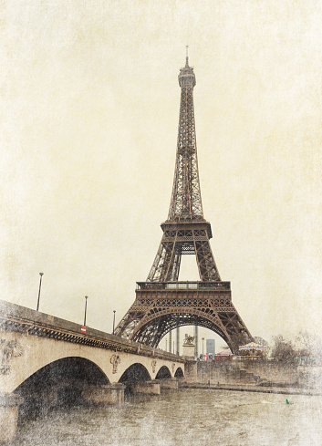 Eiffel tower view from Seine river, Paris, France. Photo in retro style.  Added paper texture