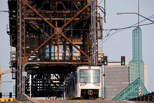 istock City tram on large truss bridge with modern buildings 473565890